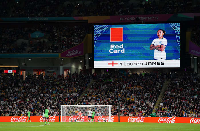A giant screen at Brisbane Stadium pictured announcing a red card for England forward Lauren James shortly after she had been sent off for violent conduct during a game against Nigeria at the 2023 FIFA Women's World Cup